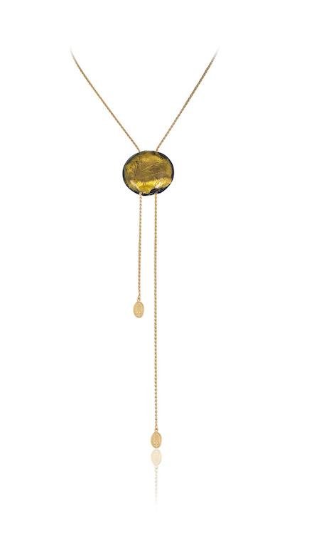 Gold lariat necklace with a single amber glass bead